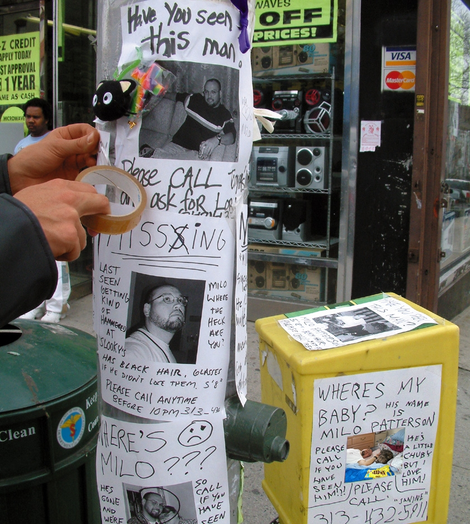 A local resident posts a sign in hopes someone has seen Patterson (below).